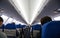 Interior of the aircraft cabin, ceiling, ventilation system.