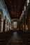 Interior of Ancient Church Cathedral with pillars, arches, and stained glass windows in Scotland, UK