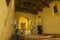 Interior of the the ancient church Propositura di San Niccolo and the old fountain in the Tuscan medieval town