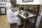 Interior of an ancient Mountain pharmacy in Barnaul, pharmacist prepares medicine in laboratory. Altai Region, Siberia