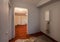 Interior of apartment with carpet and electric box fuse box with wires during upgrade or remodeling, renovation, extension, r