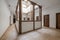 Interior atrium of a renovated vintage house with exposed wooden beams