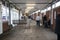 Interior of bus station showing people waiting in waiting area with seating