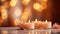 INTERIOR Candles in a glass candle holder.Lighted candles on the table, decor, aroma candles.Lights on bokeh background.