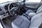 The interior of the car Toyota Hilux pickup with a view of the dashboard, steering wheel, front seats after cleaning before sale