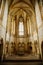 Interior of Chapel of St. Archangel Michael in medieval castle Bezdez, gothic arched windows in church, rib vault, altar part,