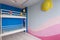 Interior of a children`s room for two girls after repair, painted wall and bunk bed