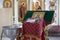 The interior of a Christian church. Prayer table covered with patterned red cloth.