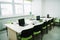 interior of classroom with laptops on desk at stem