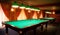 Interior of a club having billiard tables