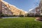 Interior common areas of a residential housing development with lots of grass,