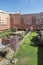 Interior common areas of a residential housing estate with gardens, trees