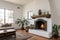 interior corner of a whitewashed spanish revival home with a fireplace