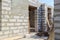 interior of a country house under construction. Site on which the walls are built of gas concrete blocks with wooden formwork