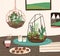 Interior of cozy room with succulents, cactuses and other desert plants growing in glass vivariums or florariums