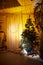 Interior with decorated cristmas tree in cozy room. Location for a photo shoot in the studio