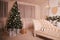 Interior with decorated cristmas tree and sofa in beautiful room. Location for a photo shoot in the studio
