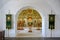 Interior decoration with golden icons and white walls of the Church of St. Nicholas the Wonderworker