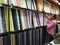 Interior Design Cloth Store and Colorful Men shirt, pant, saree and blouse rolled and well arranged in a shelf