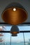 Interior design, indoor lamps and electricity concept - R ound lamp in a room, elegant modern home decor lighting. retro luxury