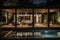 Interior design of a lavish side outside garden at evening, with a teak hardwood deck and a black pergola