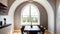 Interior design of modern small dining room with arched window