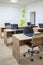 Interior. Empty classroom. Desks with laptops