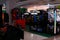 Interior of an empty darkened amusement arcade hall