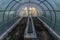 Interior of empty greenhouse before spring with concrete walls