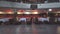 Interior of an empty restaurant with served tables