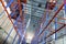 Interior of Empty Storage Warehouse. Racks Pallets Shelves. Metal Construction. Row of Tall Shelf in Distribution Storehouse