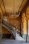 Interior entrance, marble stairs and statue in La Guarida paladar restaurant in Havana