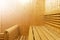 Interior of Finnish sauna, classic wooden sauna, Finnish bathroom. Wooden sauna cabin. Wooden room. Sauna steam. Soft lighting