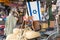 Interior garage sale, housewares, clothing, sporting goods  with a Flag of Isreal in the center