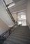 The interior of the Grand staircase inside the old administrative building in the industrial area of the old European city