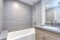 Interior of grey modern bathroom