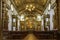 Interior of historic 18th century church in gold-plated baroque style