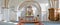 Interior of a historical church with rows of benches, a pulpit, nave or alter with kneeler cushions and sacred figure of