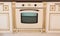 Interior and home concept - Vintage style electric oven in kitchen