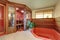 Interior of home wooden sauna cabin with jacuzzi bath