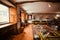 Interior of a hotel lobby with vintage furniture and windows