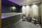 Interior of a hotel spa with jacuzzi bath with ambient lights