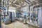 The interior of an industrial boiler house with a multitude of p