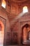 Interior of Jama Masjid with a beam of light coming through the