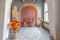 Interior of a large apartment in oriental mixed with loft style with arches, led lighting and bright orange elements