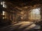 The interior of a large derelict old wooden rural barn with atmospheric sunlight coming through windows and scattered farm