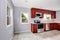 Interior of lavender kitchen with burgundy cabinets