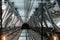 Interior, lift shaft,  view from lift car showing wire rope cables and steel supports with motion blur