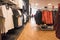 Interior of mens menswear fashion clothing department in large shop store