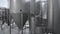 interior of modern brewery with beer fermentation tanks